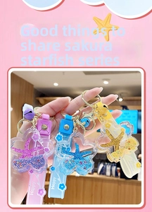 Macro shot of colorful Sakura starfish keychains with glitter liquid and silicone wristbands