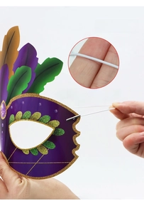 Detailed view of purple feather masquerade mask with elastic strap and gemstone accent