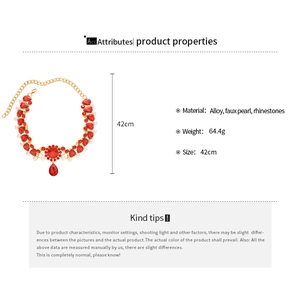 Detail view of pearl and ruby style necklace with 42cm length and 64.4g weight specifications