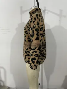 Detail of plush faux fur jacket texture with classic brown and black leopard print