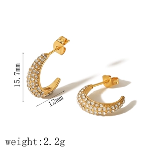 Detail view of 18k gold plated U-shaped earrings with clear zircon stones 15.7mm size