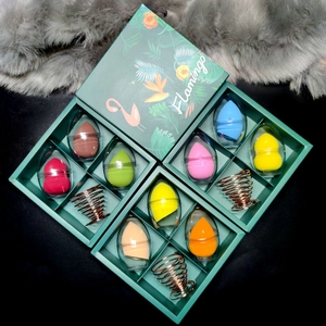 9-piece multicolor beauty blender set with 3 metal stands in a green flamingo gift box