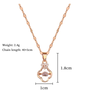 Detail of rose gold clover pendant with sparkling diamonds and product dimensions