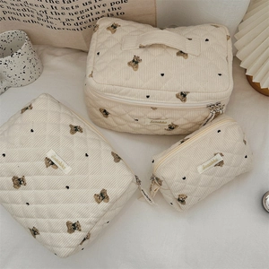 Three-piece beige corduroy storage set with quilted bear patterns and heart designs