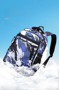 Close-up of lightweight blue camo backpack showing mesh side pocket and zipper details