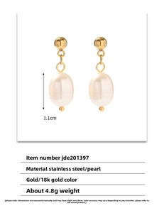 Macro detail of French vintage pearl earrings featuring 18k gold-plated stainless steel finish