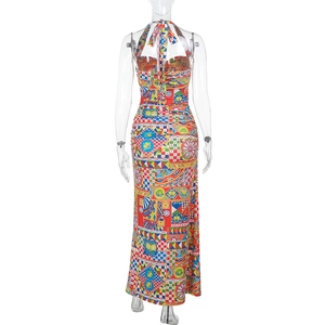 Detailed back view of a colorful halter neck maxi dress with Mediterranean print and open back