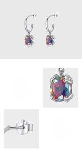 Detail of S925 sterling silver earrings with colorful oval zirconia and pave setting