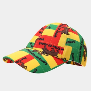 Detail of Rasta flag colors baseball cap featuring Judah Lion embroidery and text