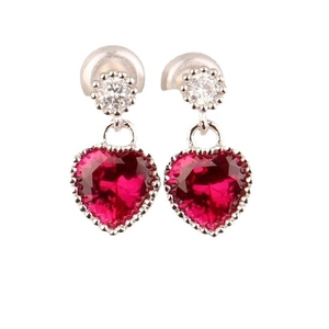 Elegant S925 silver stud earrings featuring faceted red heart-shaped ruby stones