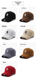 Multiple colors of cotton baseball caps featuring gothic letter R embroidery detail