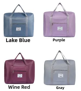 Four colors of large capacity travel bags in waterproof oxford fabric on white background
