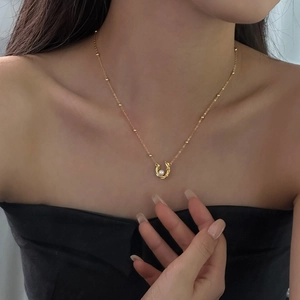 French vintage s925 silver necklace with U-shaped gold pendant and white pearl detail