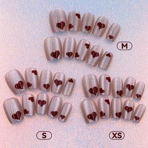 Short cat-eye red heart press-on nail set in XS, S, M sizes with glitter finish