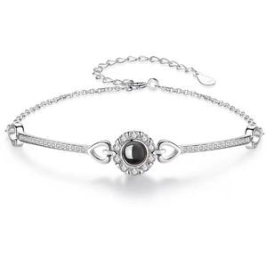 Silver projection bracelet with sparkling crystal and black stone for women