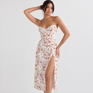 Detail of white floral sundress showing delicate lace trim and sexy side slit design