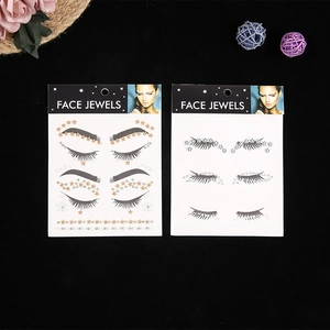 Face jewels set with gold stars and silver floral gems for festival party makeup decor