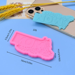Pink silicone MOM mold with floral patterns for baking and DIY crafts, 10x3.5x0.8cm size