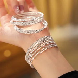 Sparkling silver multi-layered rhinestone spiral bangle with pave zircon setting for women