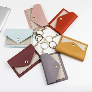 Slim PU leather card holders in candy colors with keychain and metal snap closure