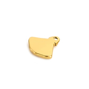 Detailed macro view of a fan-shaped ginkgo leaf gold pendant with a polished finish