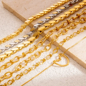 Detailed close-up of woven leaf titanium steel bracelets with gold and silver finishes