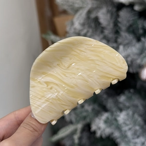 Elegant beige marble pattern acetate hair claw clip with striped texture for women