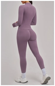 Detail view of purple yoga set featuring scrunch butt leggings and slim fit zip jacket