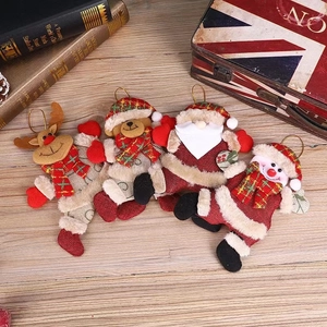 Detailed view of Christmas burlap ornaments featuring reindeer, bear, Santa, and snowman figures
