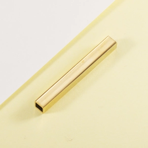 Detailed close-up of hollow gold titanium steel bar charm for DIY jewelry making