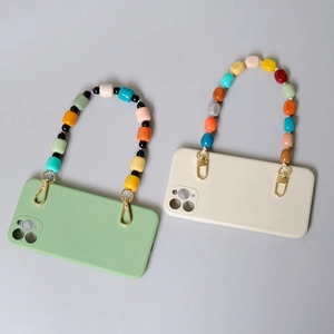 Detail of colorful chunky bead chain strap and matte finish phone case with metal hooks