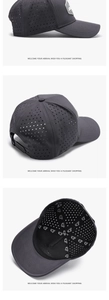 Detail of laser-cut breathable holes and rubber logo patch on dark gray baseball cap