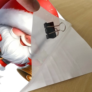 Detail showing the transparency and flexible material of a Santa Claus wall sticker