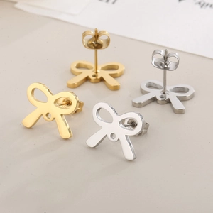 Minimalist hollow bow stud earrings in gold and silver stainless steel finish