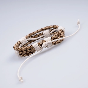 Handmade woven leather bracelet for men with brown and cream adjustable cord texture