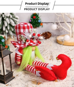 Close-up of a Christmas gnome with green beard and plaid hat in a snowy winter scene