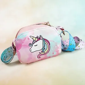 Detail view of unicorn crossbody bag showing the gradient macaron color and metal zipper
