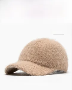 Detailed close-up of khaki plush rabbit fur baseball cap showing soft knit texture