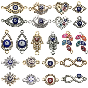 Mixed evil eye charms in hamsa, heart and leaf shapes for DIY jewelry making