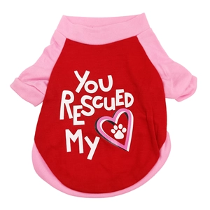 Detail of red and pink pet t-shirt with YOU RESCUED MY slogan and heart paw print
