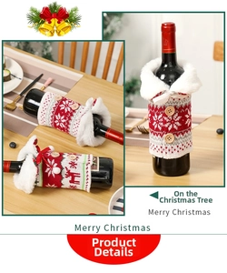 Detail of knitted Christmas wine bottle cover with snowflake patterns and fur collar