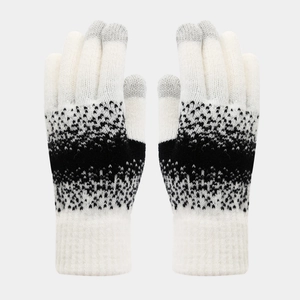 Detail view of tri-color knit touchscreen gloves with snowflake patterns and ribbed cuffs