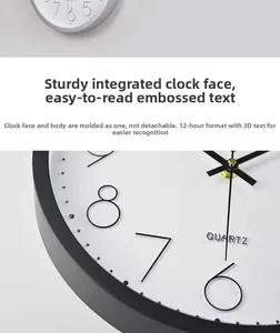 Detail of 30cm quartz wall clock featuring 3D embossed numbers on white dial face