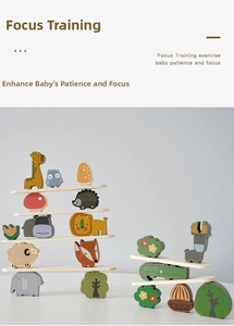 Detail of wooden animal balancing blocks including giraffe and lion for child focus training