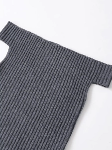 Detail of dark grey ribbed knit fabric showing off-the-shoulder neckline texture