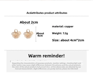 Detail view of gold hollow petal earrings with copper material and dimensions 4cm x 2cm