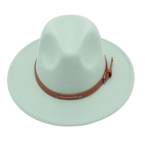 Detail of mint green fedora wool hat with brown leather band and metal buckle accents