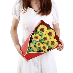 3D sunflower bouquet card in red paper wrapping held by hands for Mother's Day gift