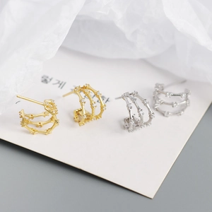 Three-layer geometric gold and silver hoop earrings with bamboo texture and cubic zirconia