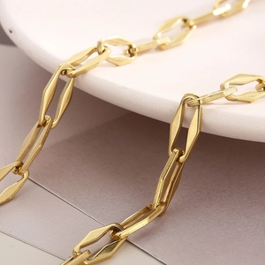 Golden titanium steel necklace with geometric links and symmetric OT clasp